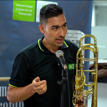 Professor Delivering a Speech at a Music Exhibition